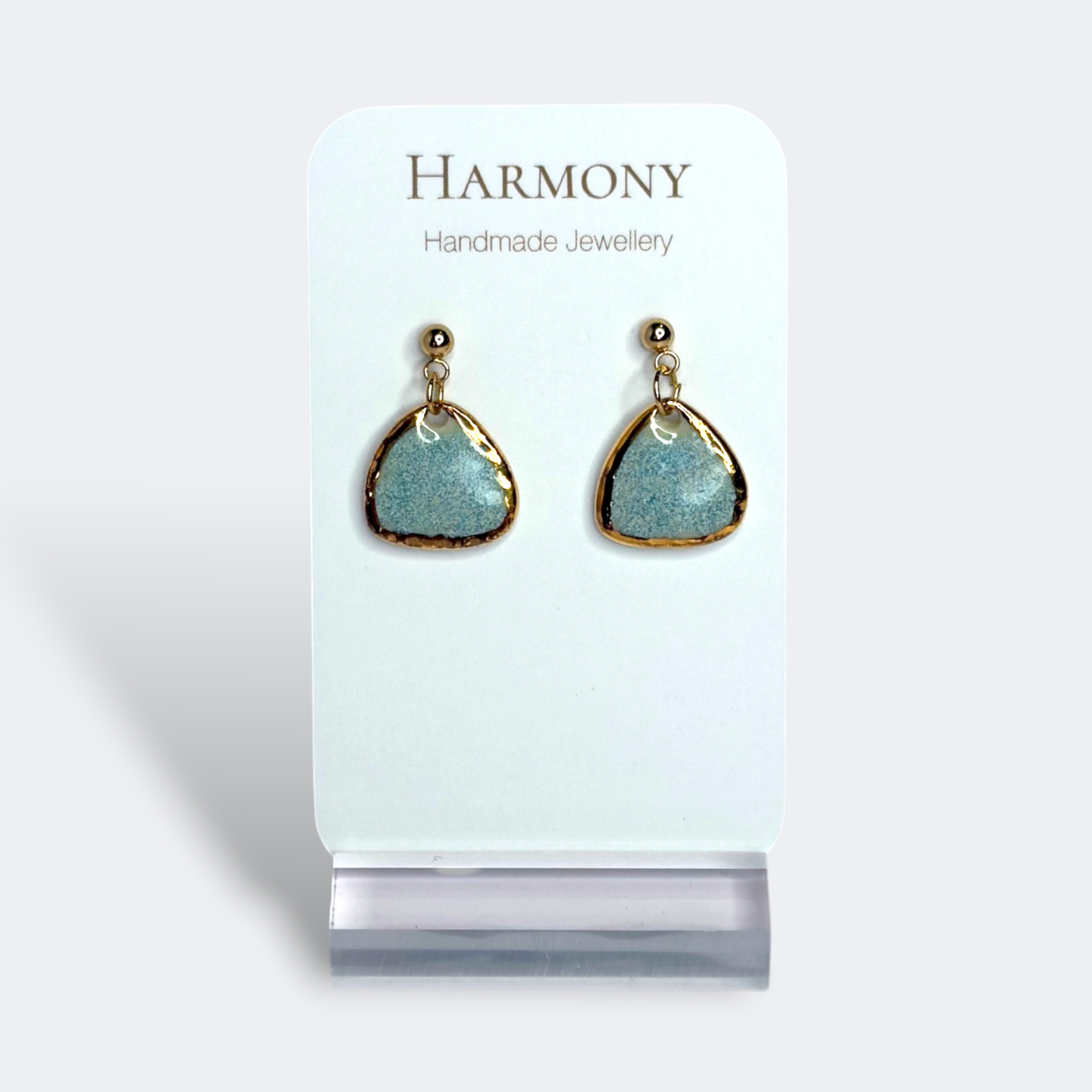 Blue-green ceramic earrings with gold rim, handmade by Harmony Pottery Melbourne