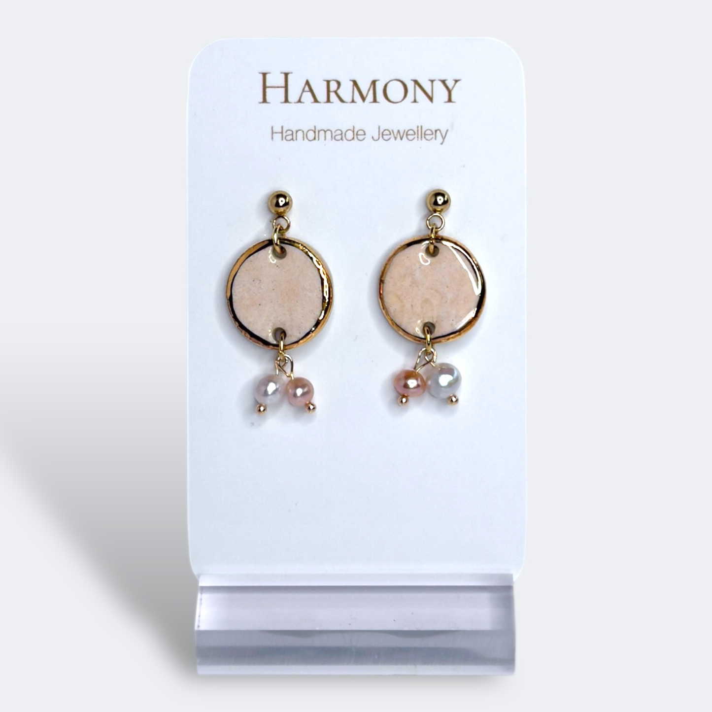 Blush Pink ceramic earrings with gold rim, handmade by Harmony Pottery Melbourne
