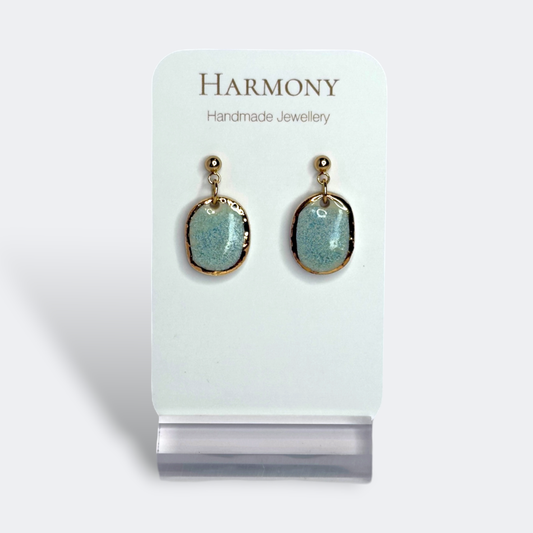 Blue-green ceramic earrings with gold rim, handmade by Harmony Pottery Melbourne