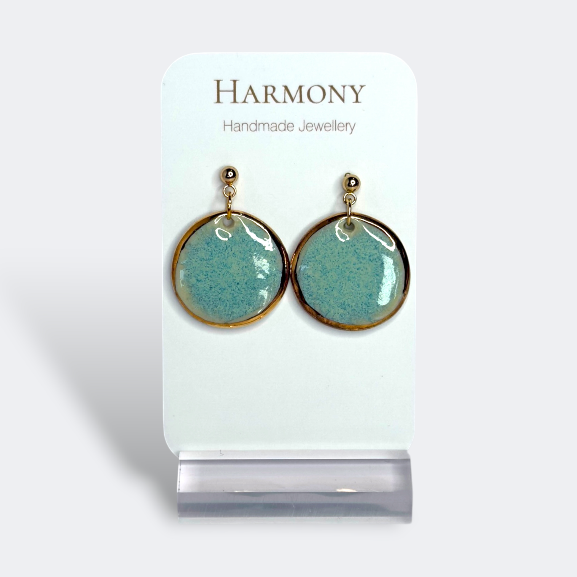 Blue-green ceramic earrings with gold rim, handmade by Harmony Pottery Melbourne