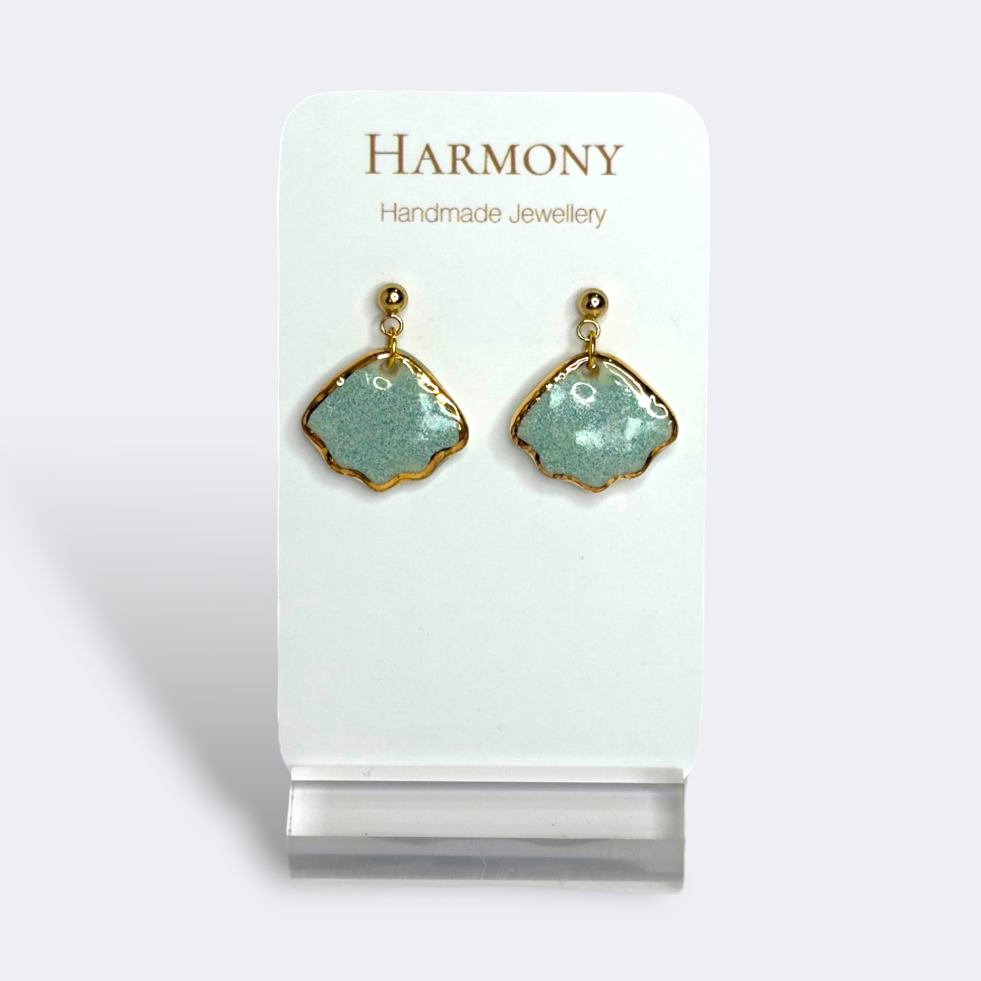 Blue-green ceramic earrings with gold rim, handmade by Harmony Pottery Melbourne