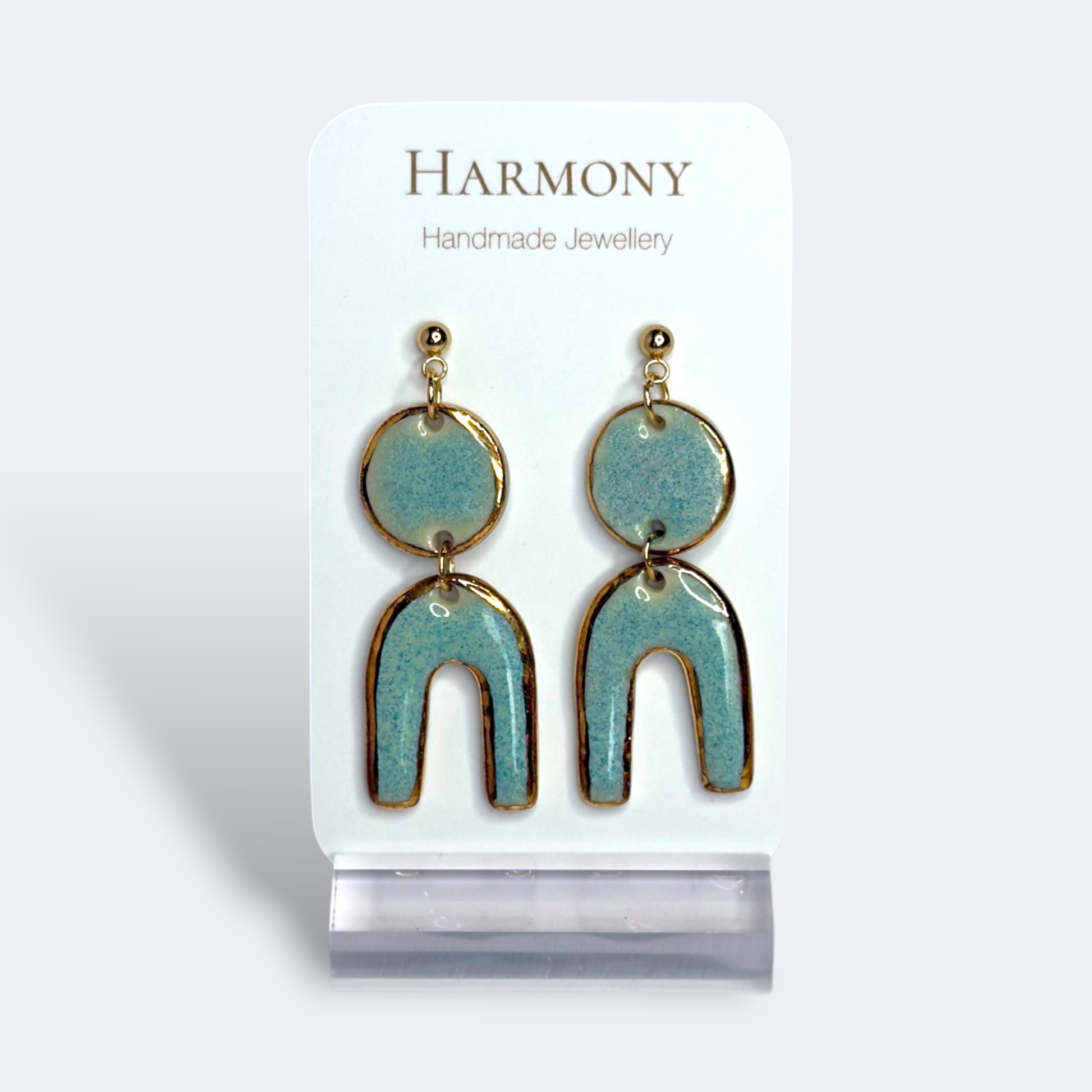 Blue-green ceramic earrings with gold rim, handmade by Harmony Pottery Melbourne