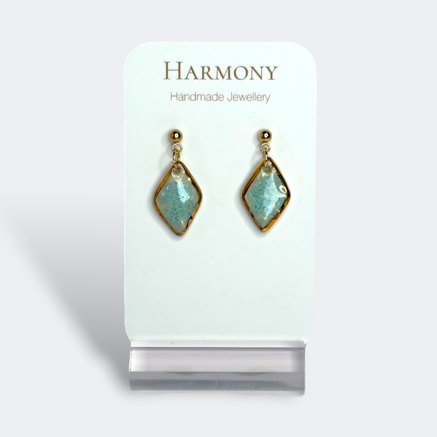 Blue-green ceramic earrings with gold rim, handmade by Harmony Pottery Melbourne