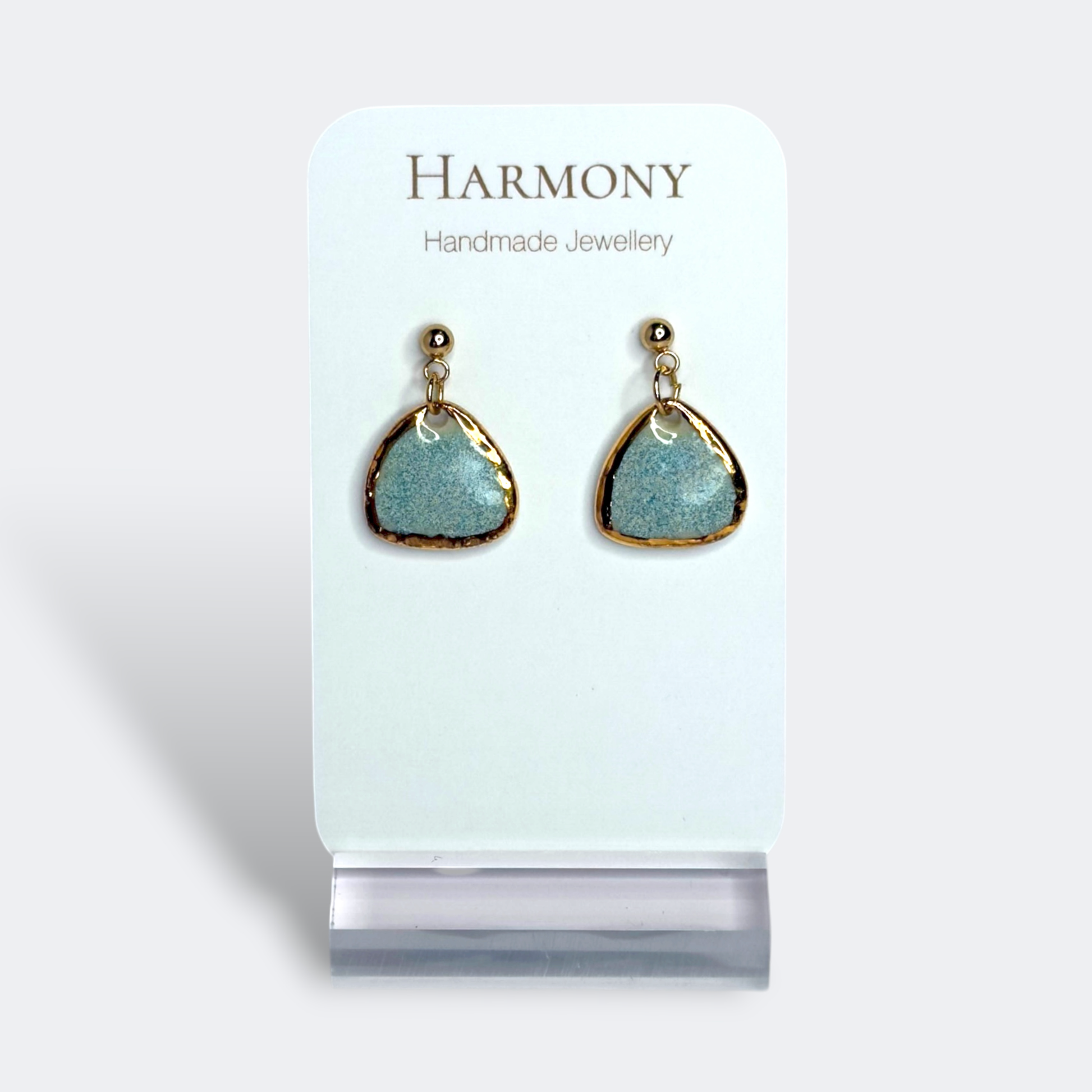 Blue-green ceramic earrings with gold rim, handmade by Harmony Pottery Melbourne