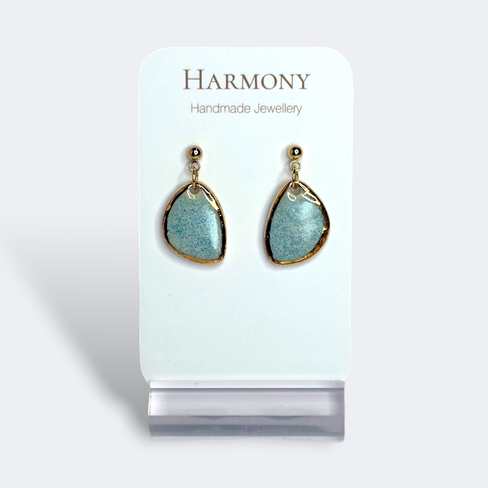 Blue-green ceramic earrings with gold rim, handmade by Harmony Pottery Melbourne