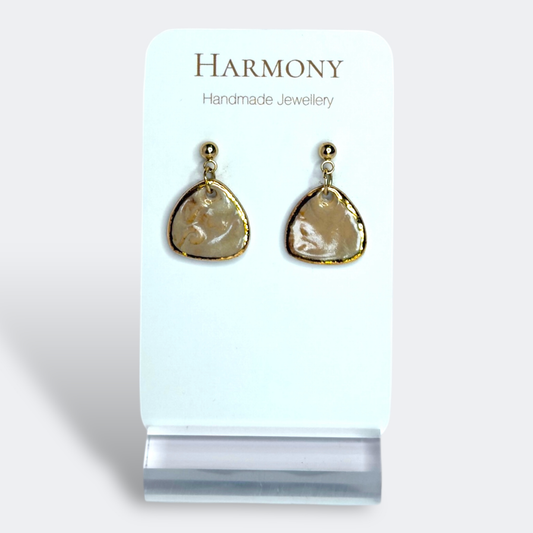 Nude Dusk ceramic earrings with gold rim, handmade by Harmony Pottery Melbourne