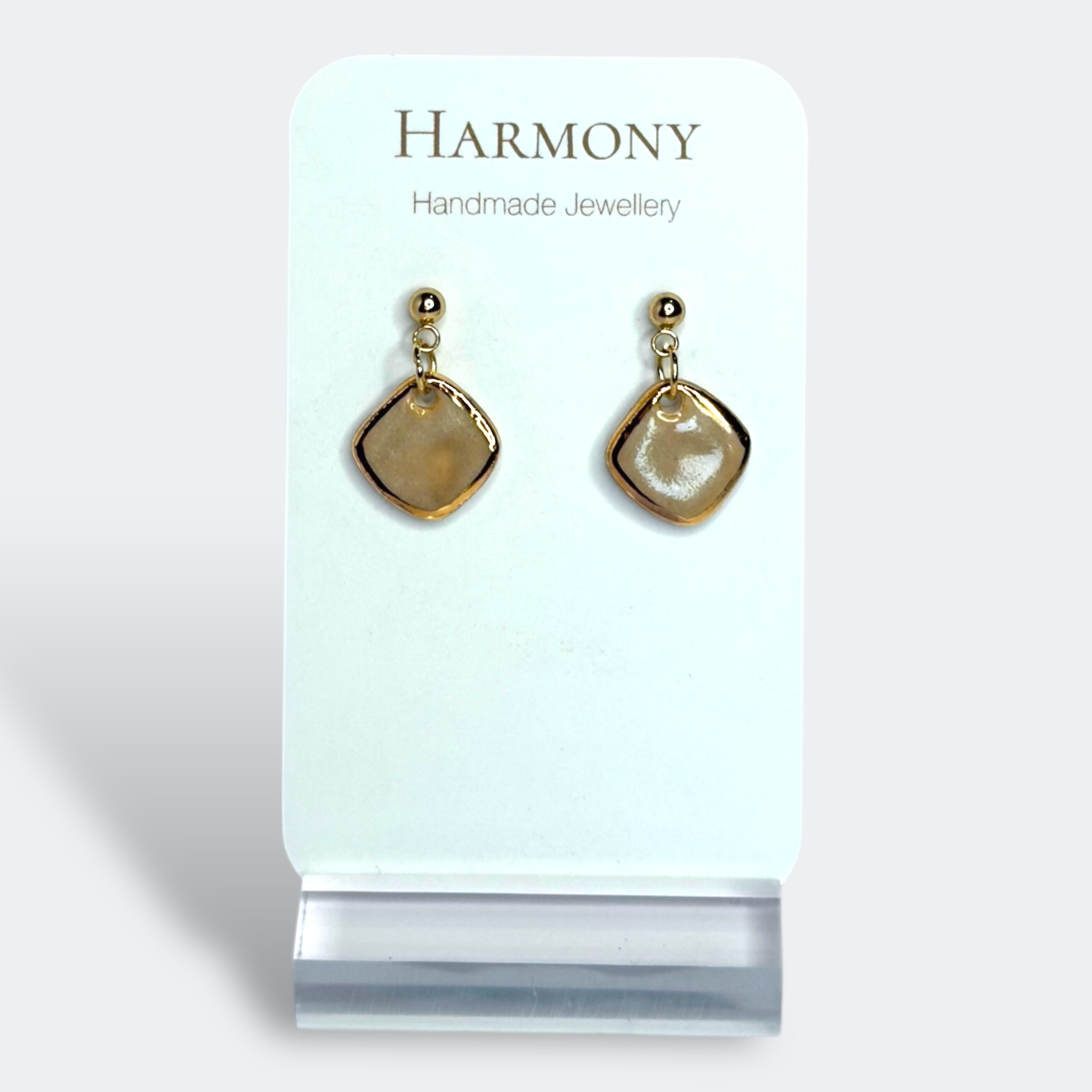 Nude Dusk ceramic earrings with gold rim, handmade by Harmony Pottery Melbourne