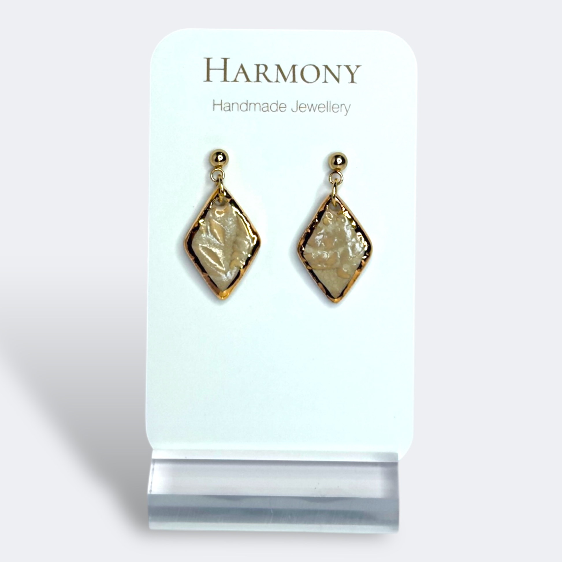 Nude Dusk ceramic earrings with gold rim, handmade by Harmony Pottery Melbourne