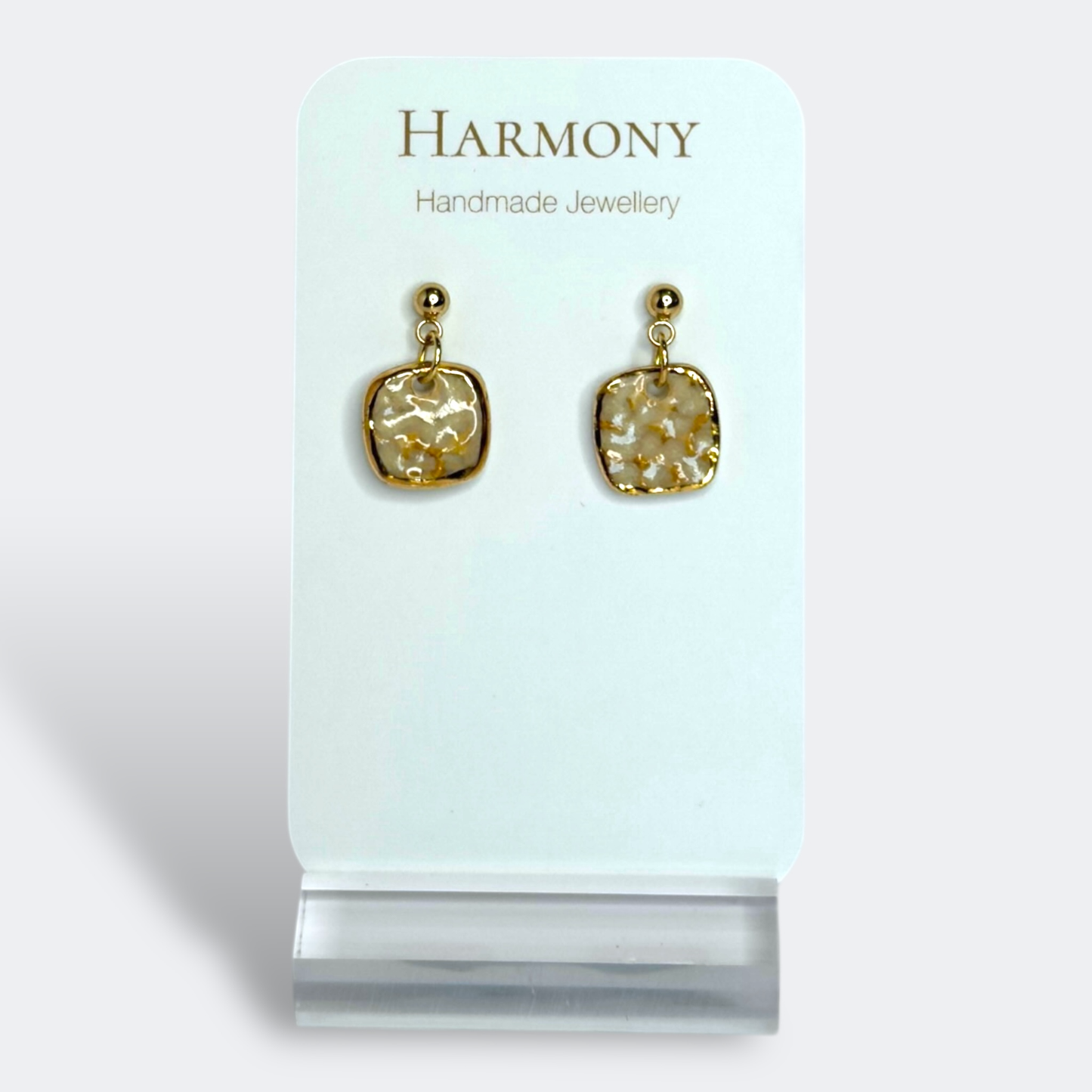 Nude Dusk ceramic earrings with gold rim, handmade by Harmony Pottery Melbourne