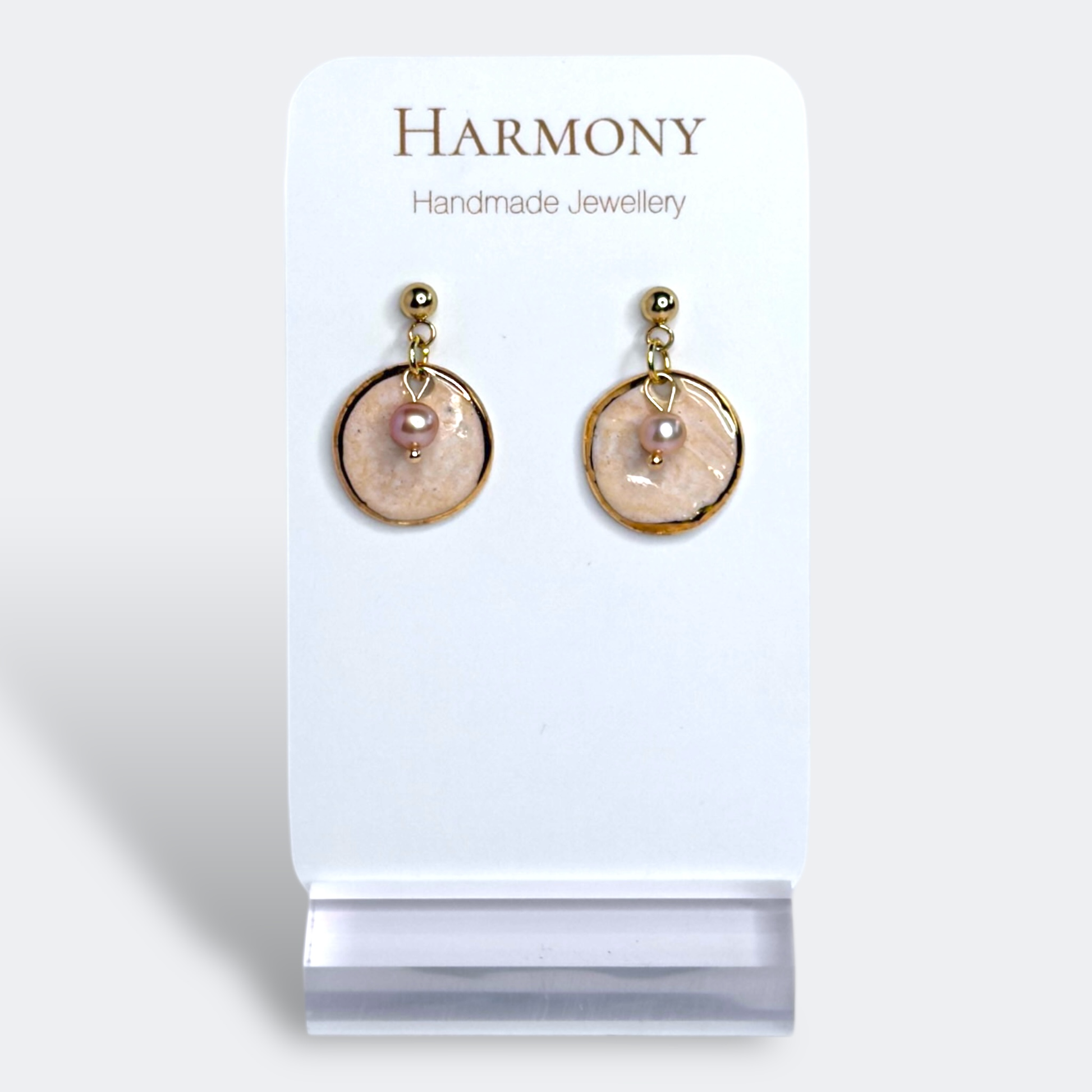 Blush Pink ceramic earrings with gold rim, handmade by Harmony Pottery Melbourne