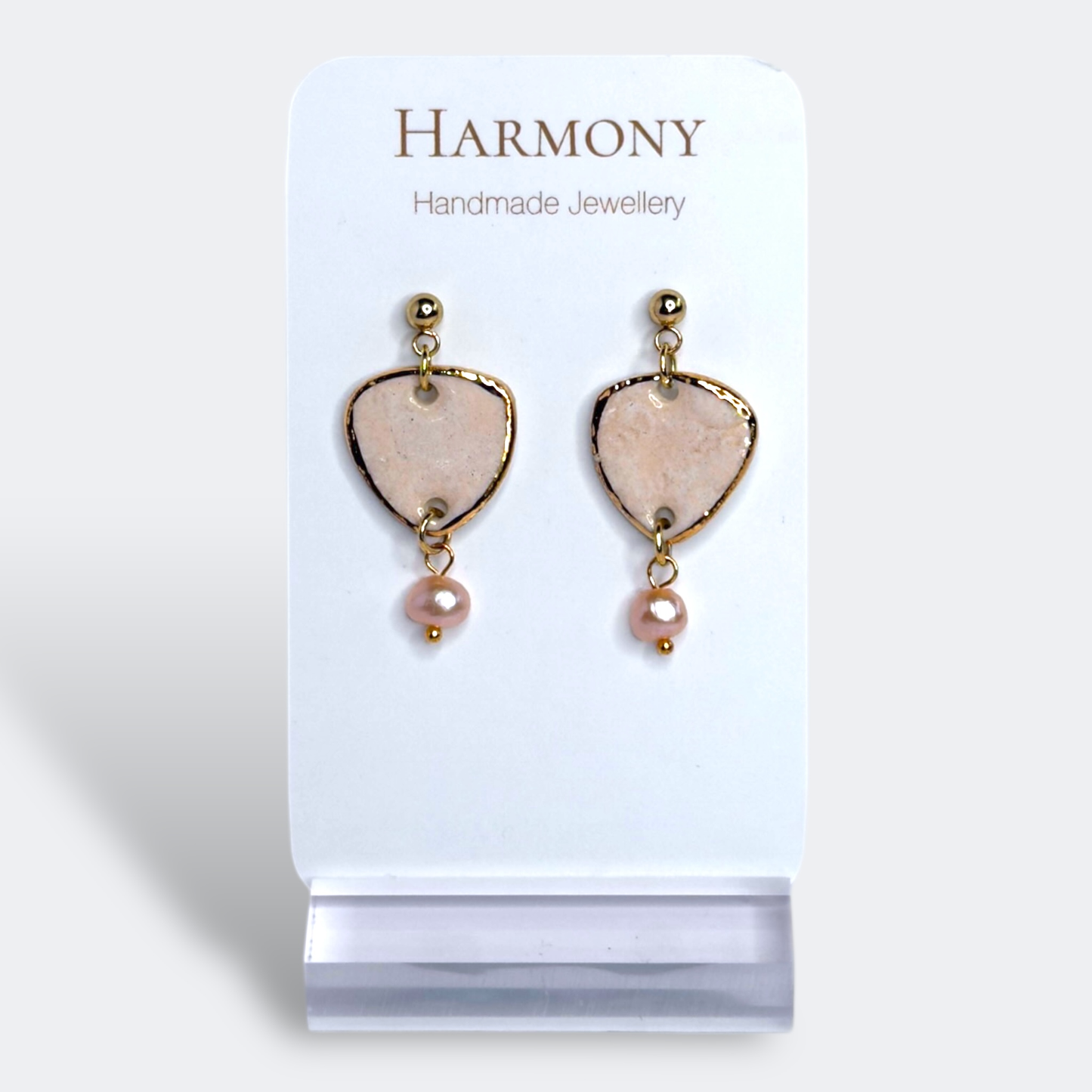 Blush Pink ceramic earrings with gold rim, handmade by Harmony Pottery Melbourne