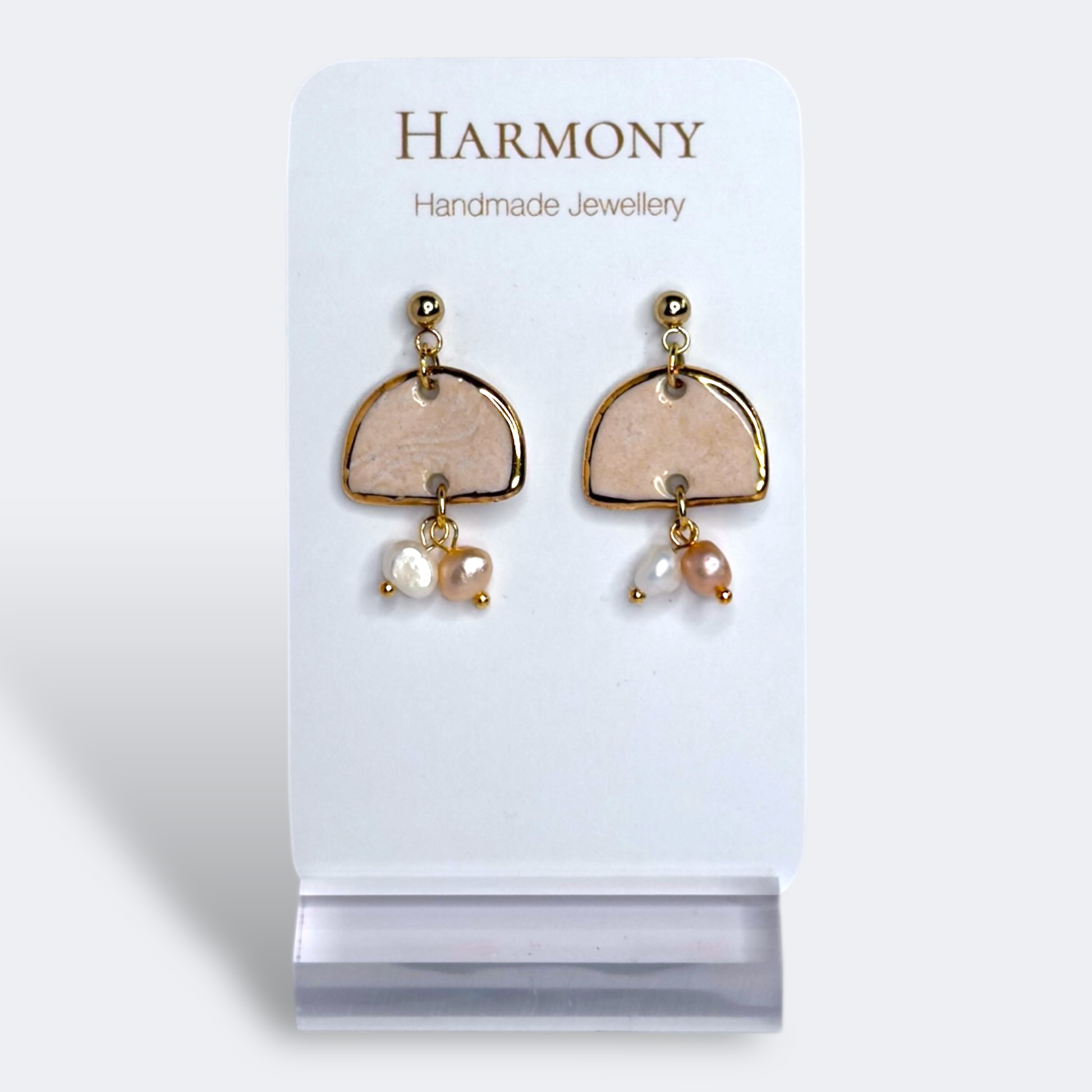 Blush Pink ceramic earrings with gold rim, handmade by Harmony Pottery Melbourne