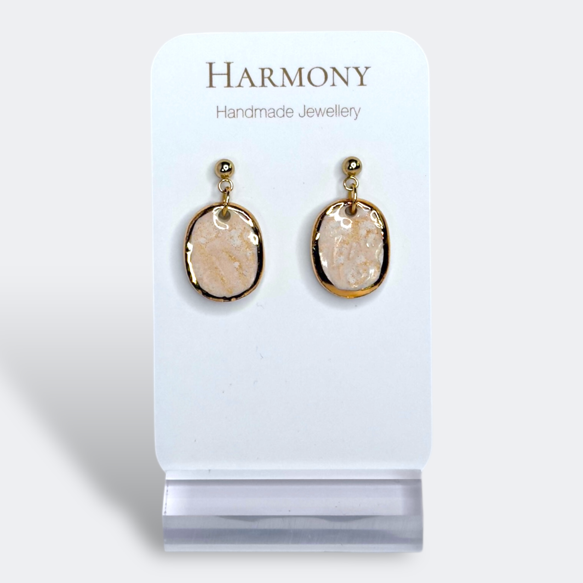 Blush Pink ceramic earrings with gold rim, handmade by Harmony Pottery Melbourne