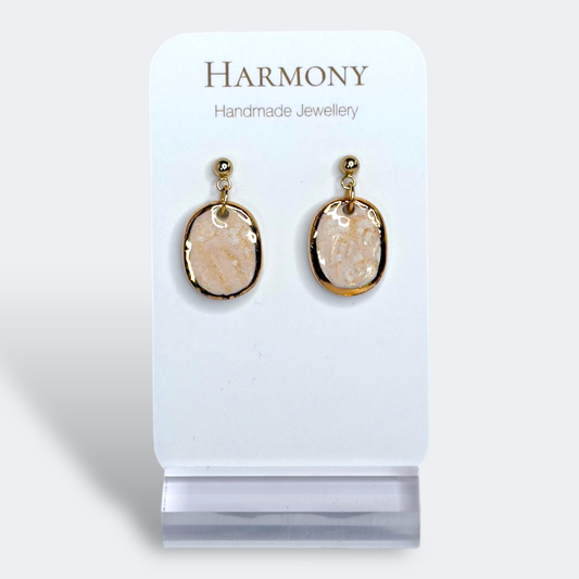 Blush Pink ceramic earrings with gold rim, handmade by Harmony Pottery Melbourne