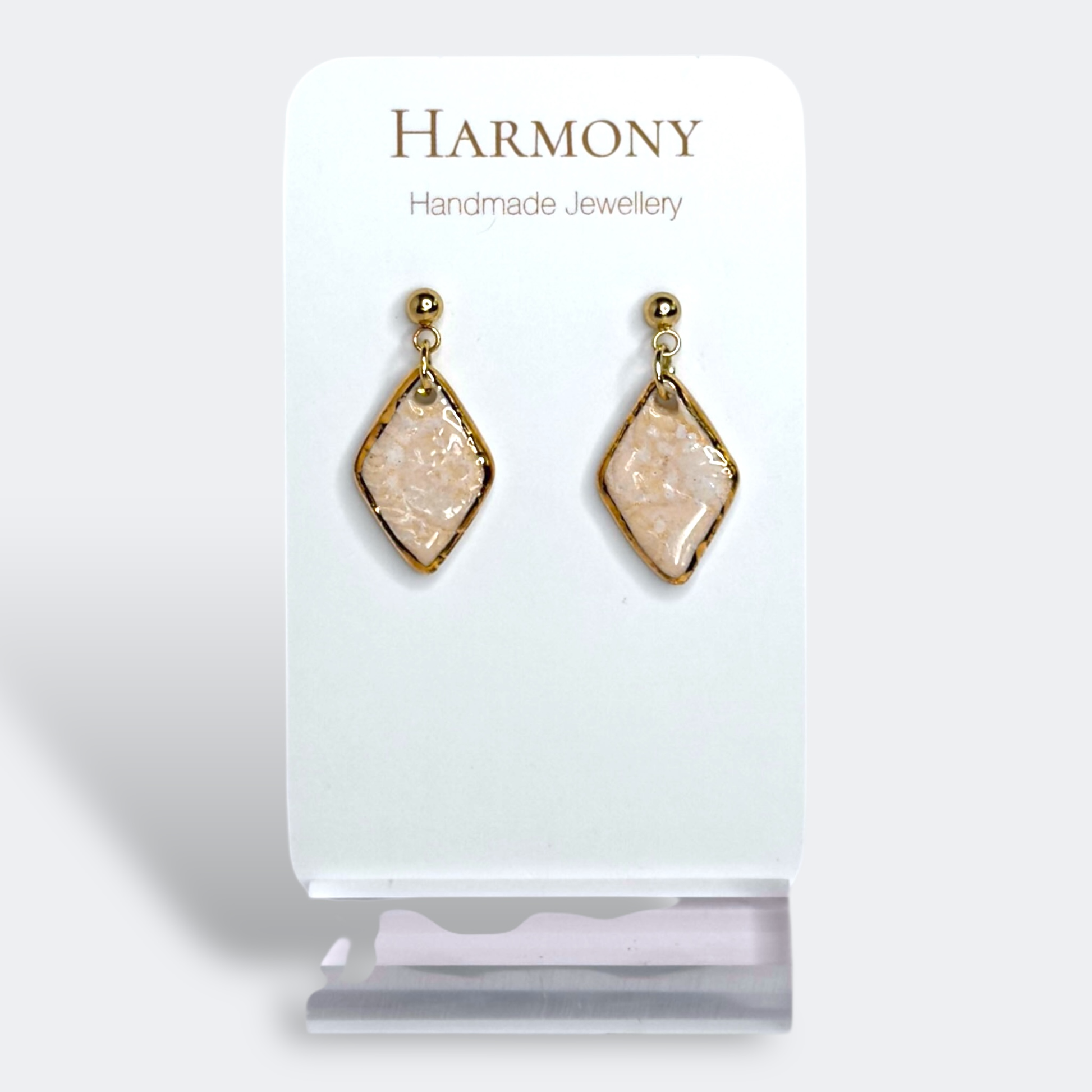 Blush Pink ceramic earrings with gold rim, handmade by Harmony Pottery Melbourne