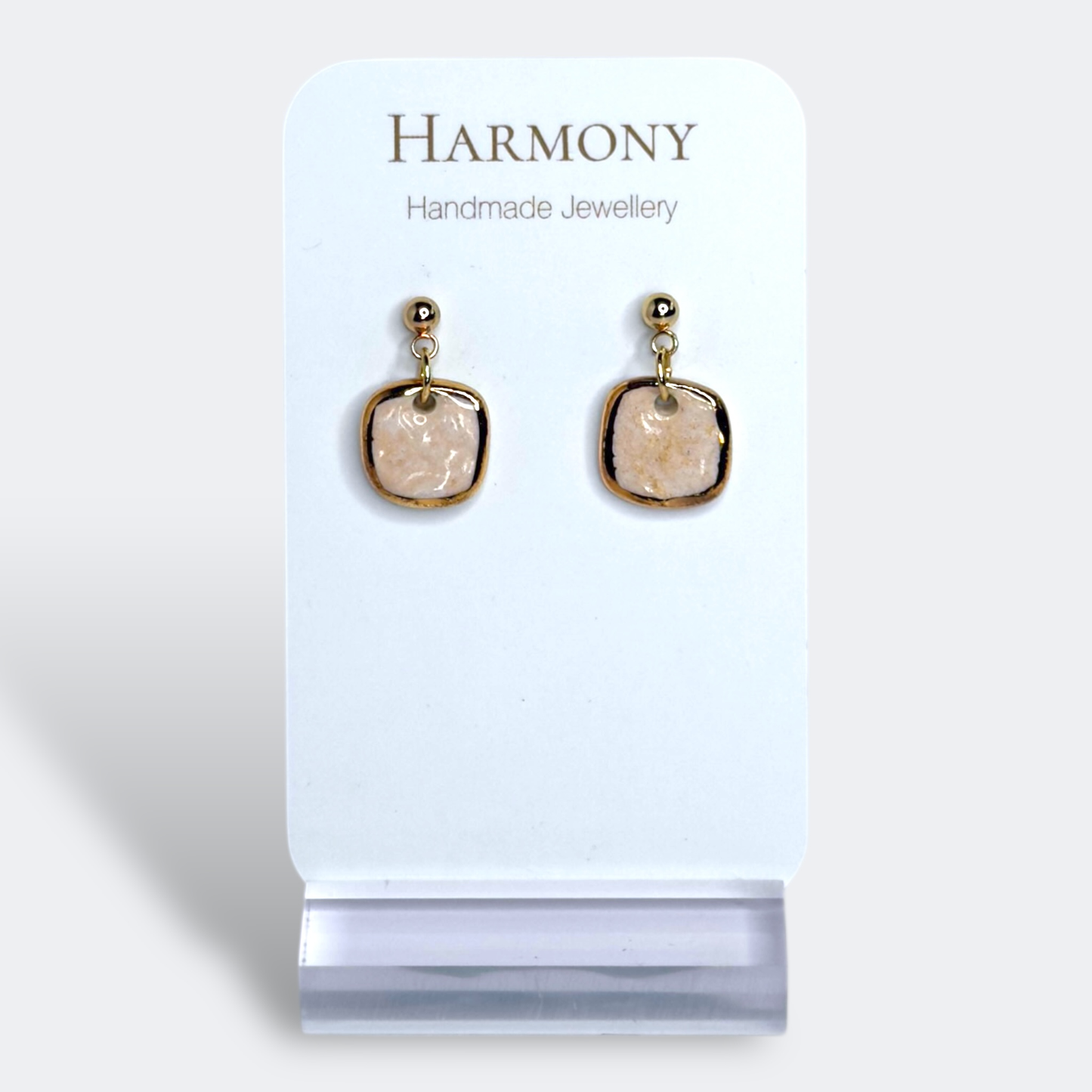 Blush Pink ceramic earrings with gold rim, handmade by Harmony Pottery Melbourne