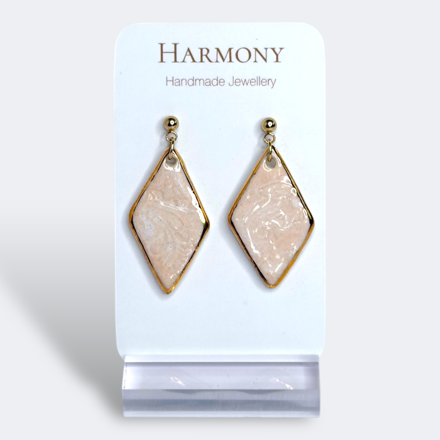Blush Pink ceramic earrings with gold rim, handmade by Harmony Pottery Melbourne